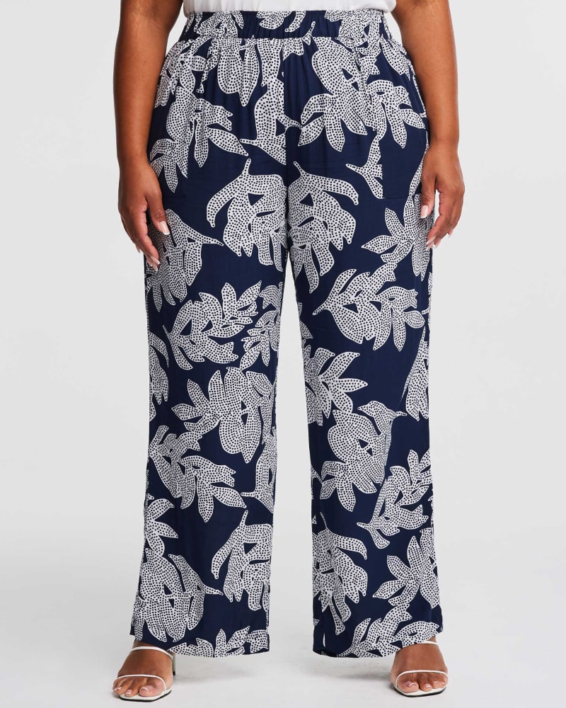 Front of a model wearing a size 18W Leafy Summer Pant in Navy/Milk by Estelle. | dia_product_style_image_id:349484